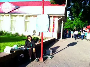 One of Bishkek's many yasnovidyashis. She wasn't our yasnovidyashi, but she had a similar sidewalk setup (including a weight scale, if you wanted to know your weight.)