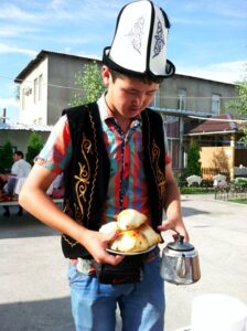 Waiter in a kalpak