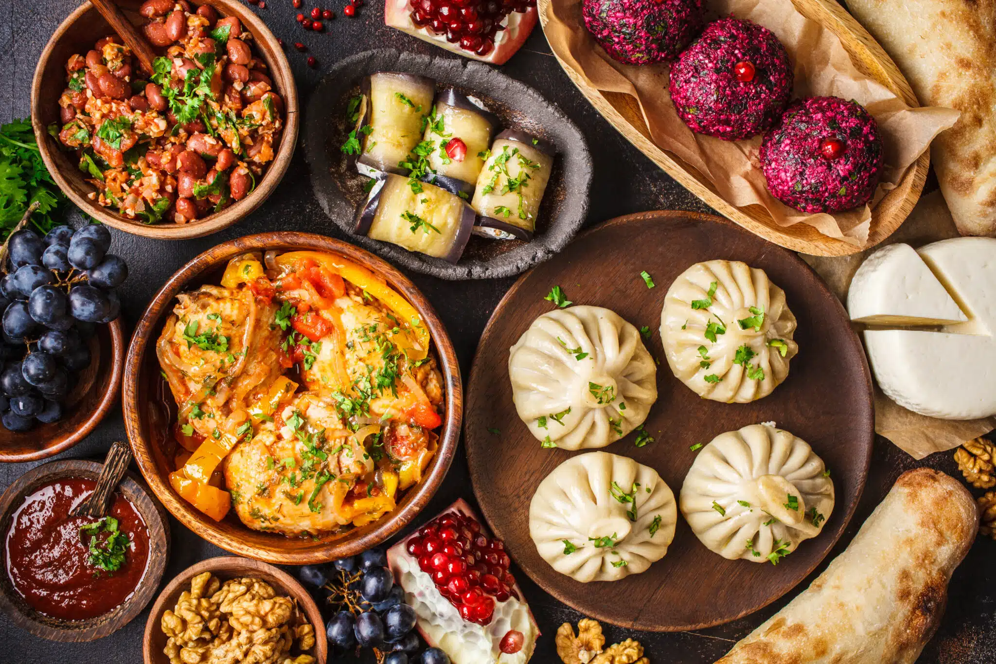 Traditional Georgian cuisine. Khinkali, phali, chahokhbili, lobio, cheese, eggplant rolls.