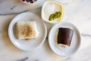 Milk Desserts of Turkish Cuisine Accompanied by Turkish Tea, Turkish Pudding (Muhallebi) Chicken Breast (Tavuk Gogsu) and Kazandibi Dessert Photo, Karakoy Beyogu, Istanbul Turkey (Turkiye)