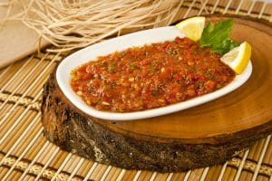 Acılı Ezme a spicy Turkish meze made from tomatoes and peppers. 