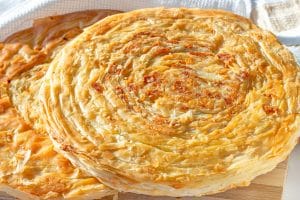 Traditional homemade Tajik fatir with cheese and onion.