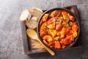 Moldovan Summer Vegetable spicy stew of zucchini, potatoes, peppers, onions, tomatoes and eggplant.